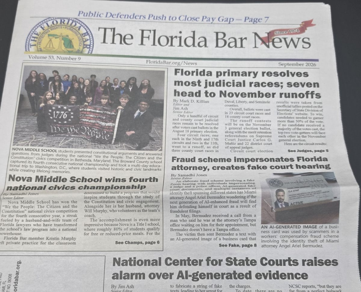 The front page of the September 2026 Florida Bar News on a desk, with headlines about a fraud scheme impersonating a Florida attorney and the National Center for State Courts raising alarm over AI-generated evidence